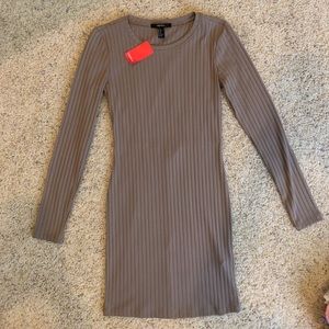 Brown, body hugging dress with open back